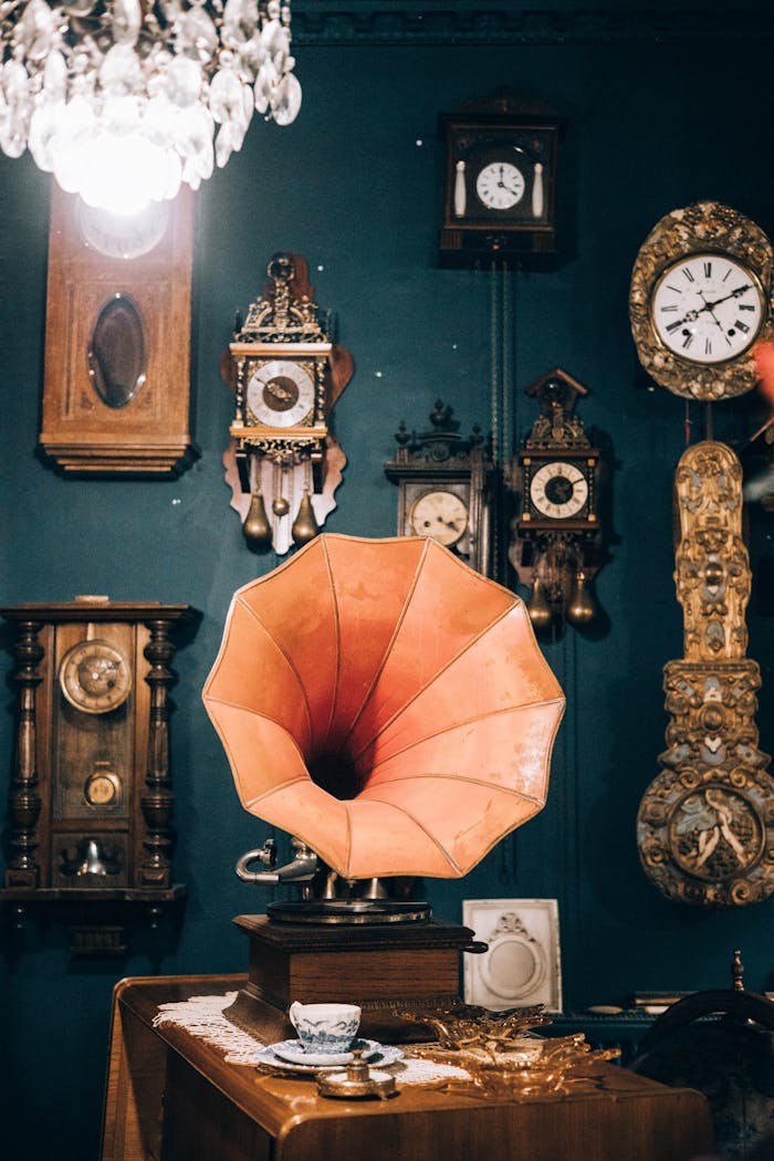 A vintage room filled with a gramophone and various antique clocks, capturing a classic aesthetic.